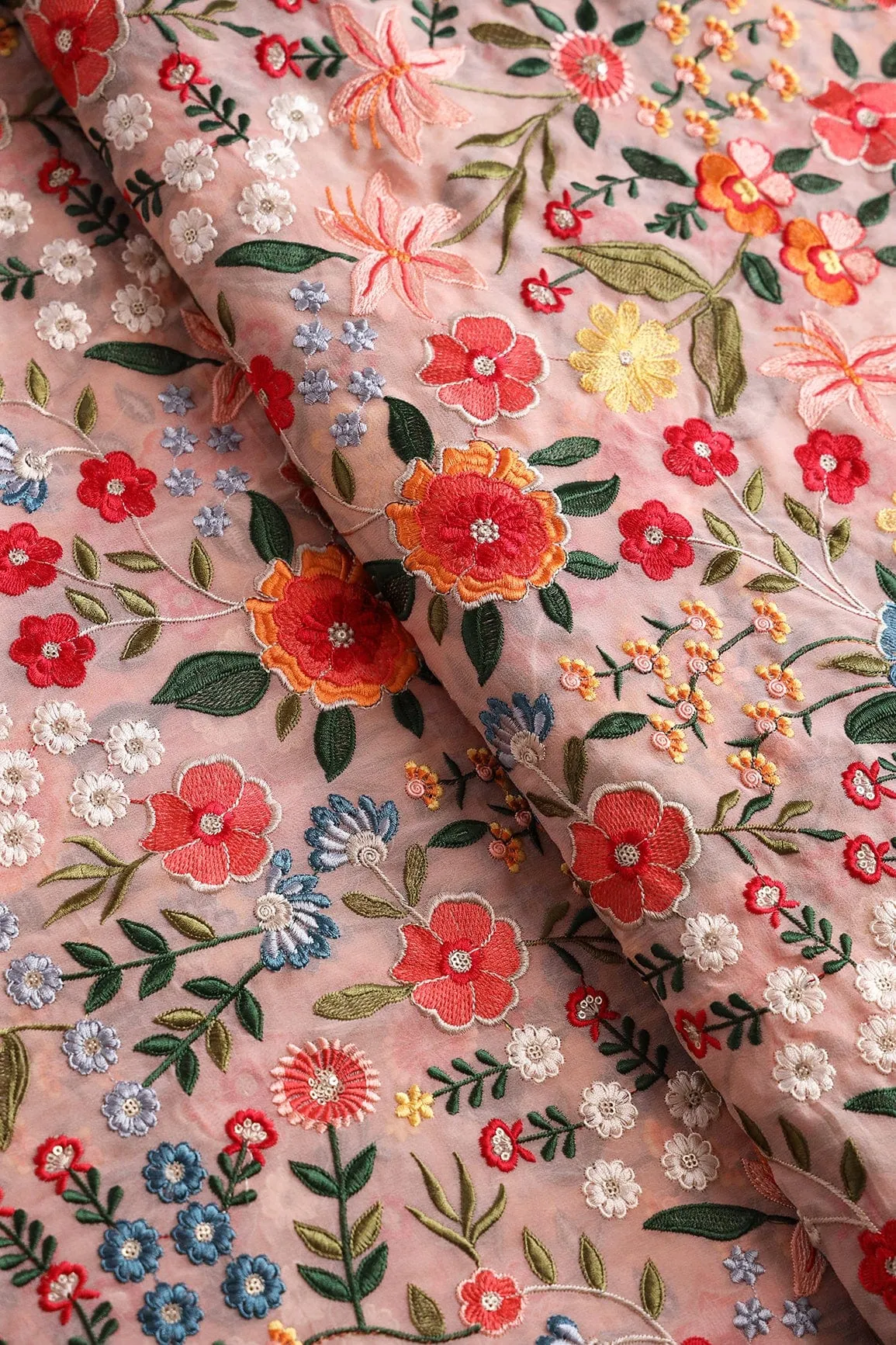 Beautiful Floral Heavy Embroidery On Peach Viscose Georgette Fabric